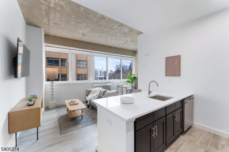 a bathroom with a sink double vanity and a mirror