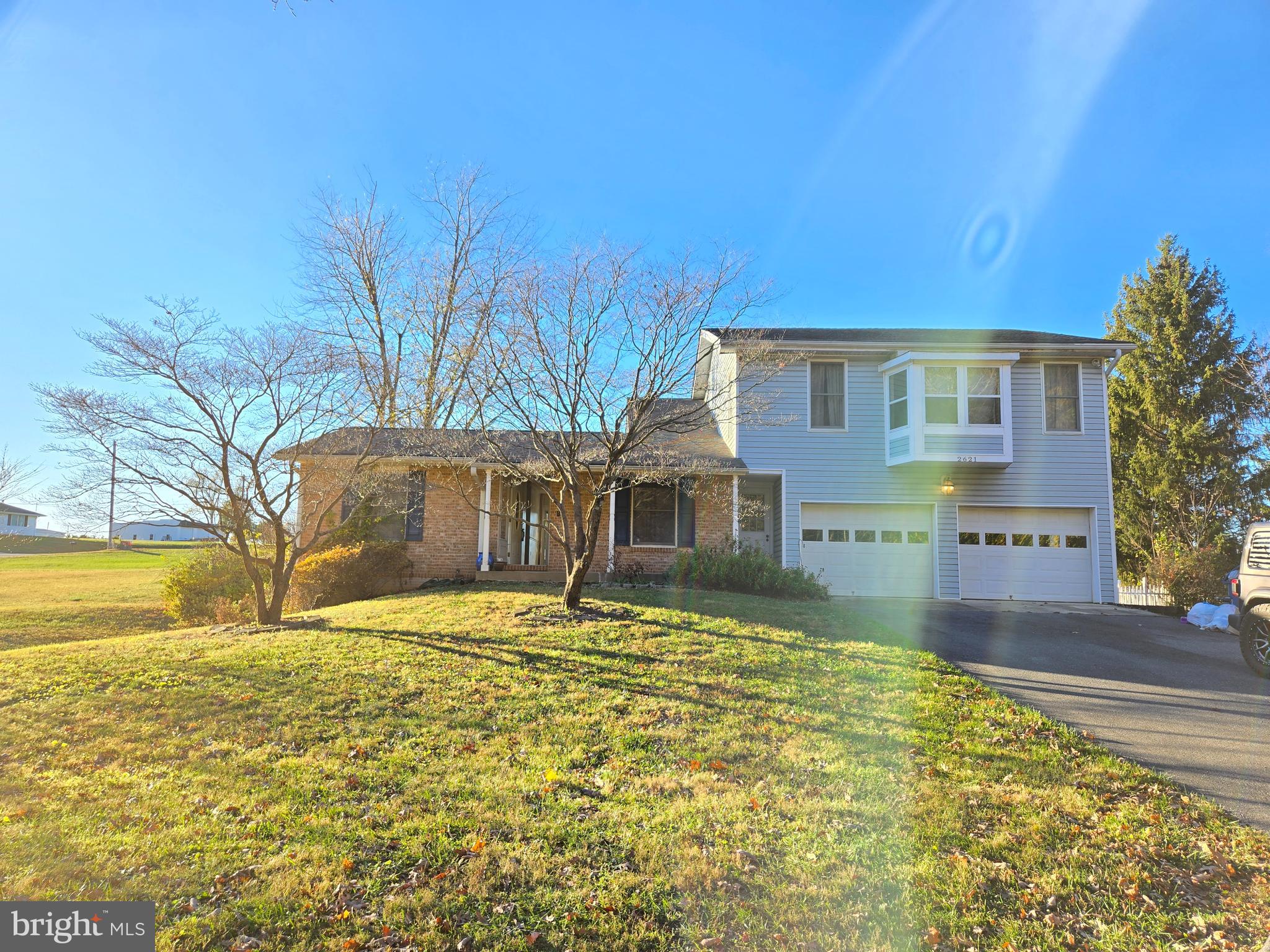 2621 Braddock Road Mount Airy, MD 21771 - Photo 1 of 15 a view of a house with a yard