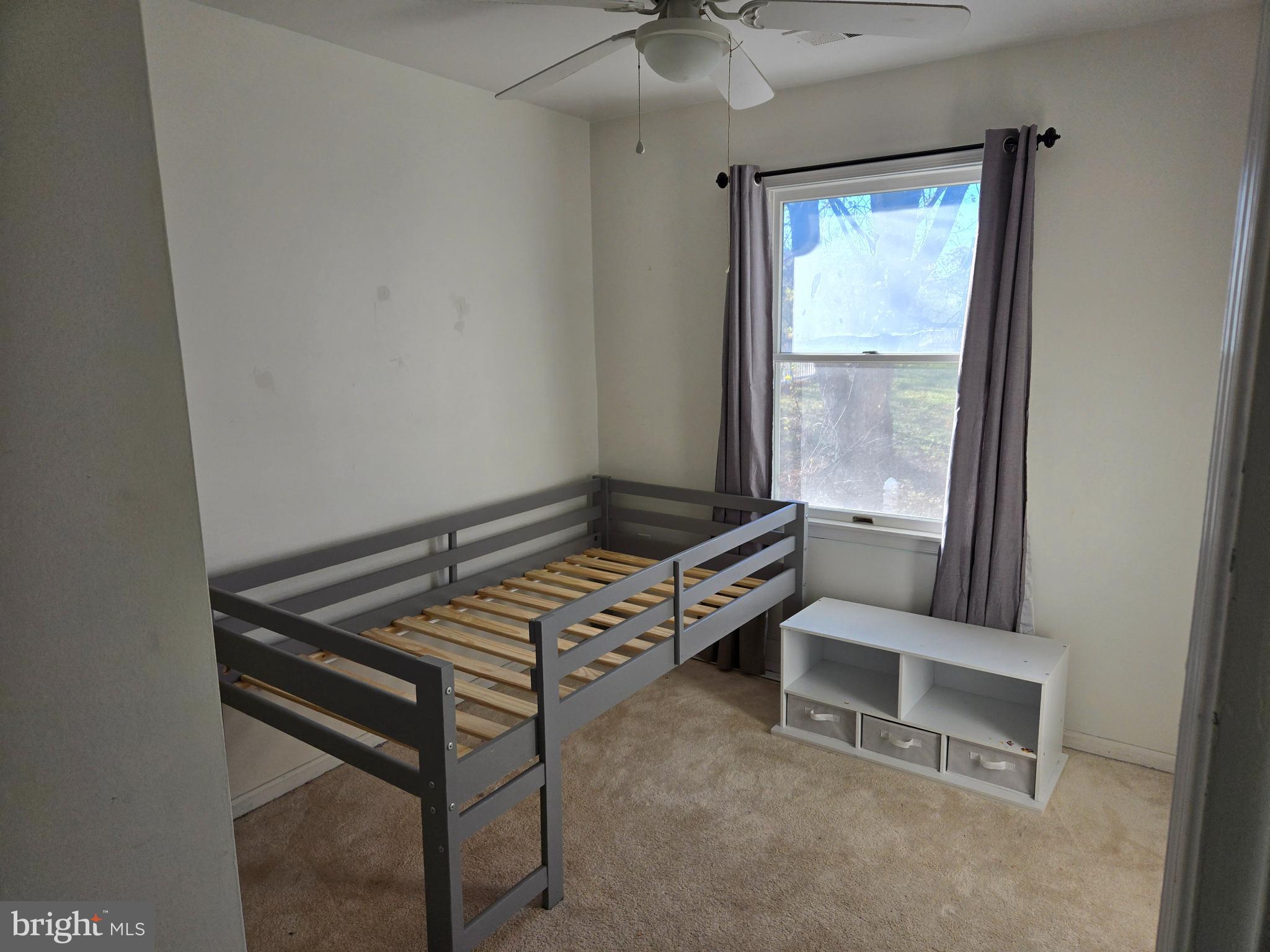 2621 Braddock Road Mount Airy, MD 21771 - Photo 13 of 15 a room with chairs and a window