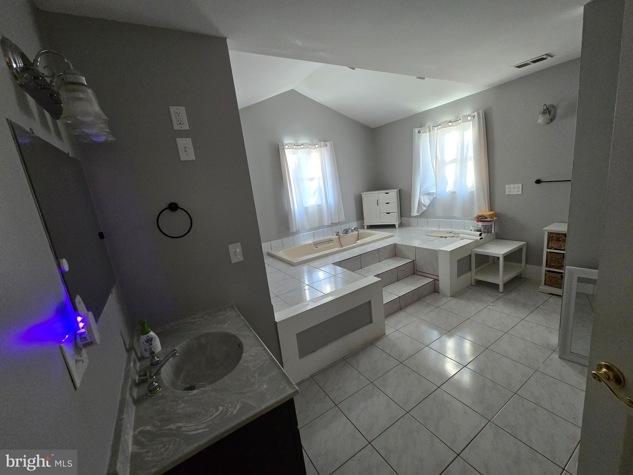 2621 Braddock Road Mount Airy, MD 21771 - Photo 14 of 15 a living room with furniture and a table