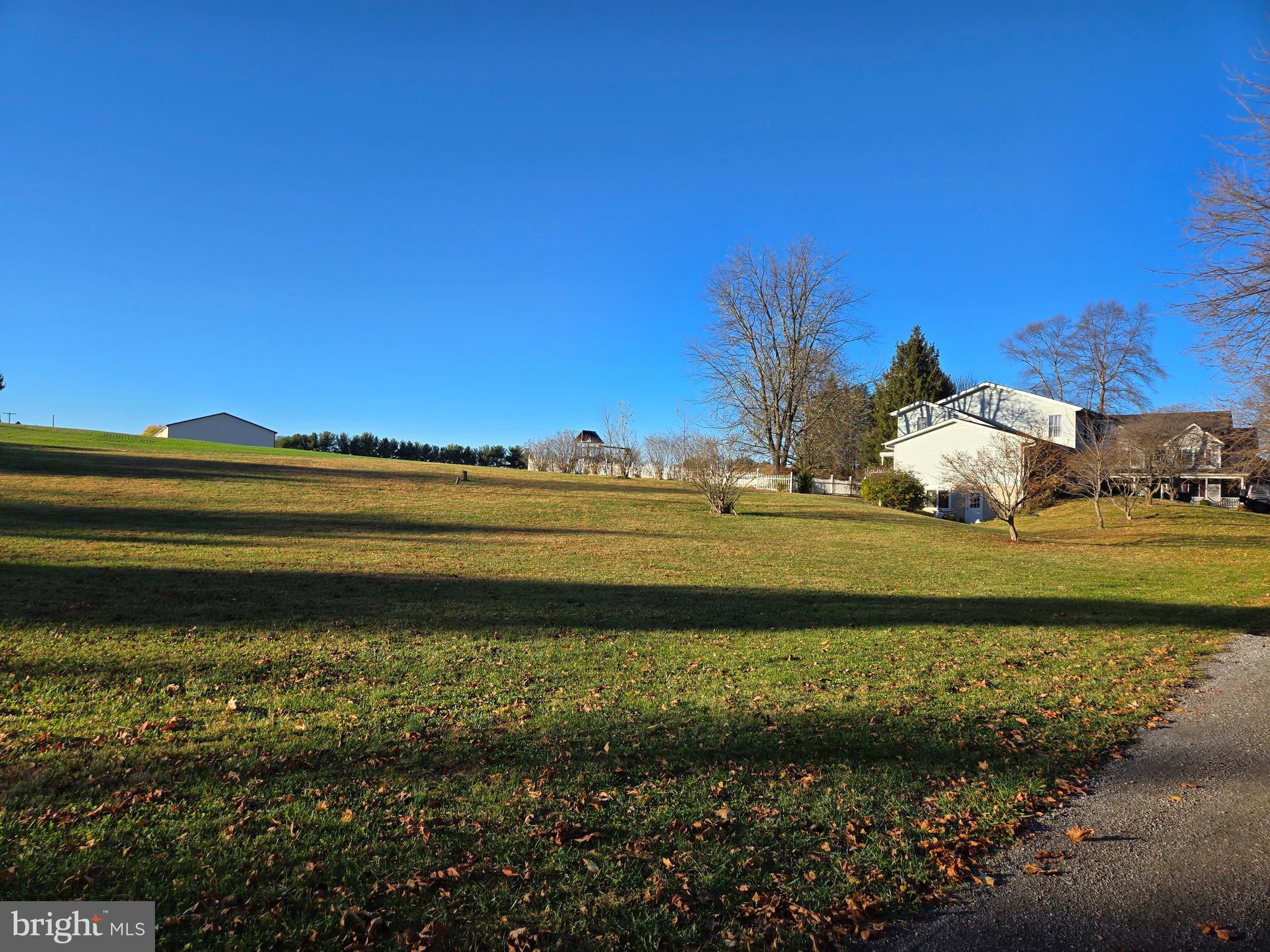2621 Braddock Road Mount Airy, MD 21771 - Photo 2 of 15 a view of a house with a yard