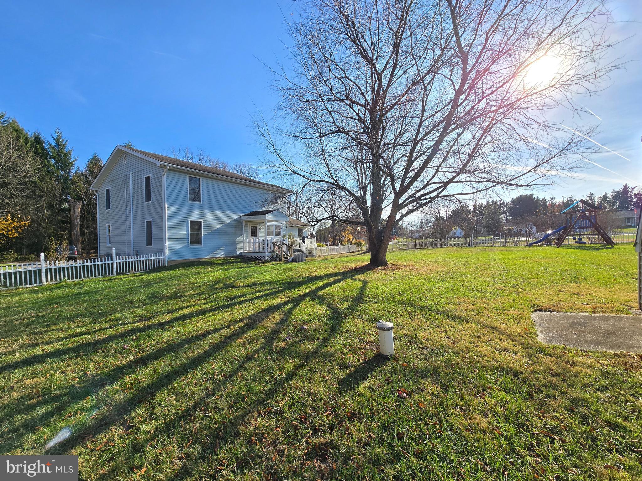 2621 Braddock Road Mount Airy, MD 21771 - Photo 3 of 15 a view of a house with a big yard