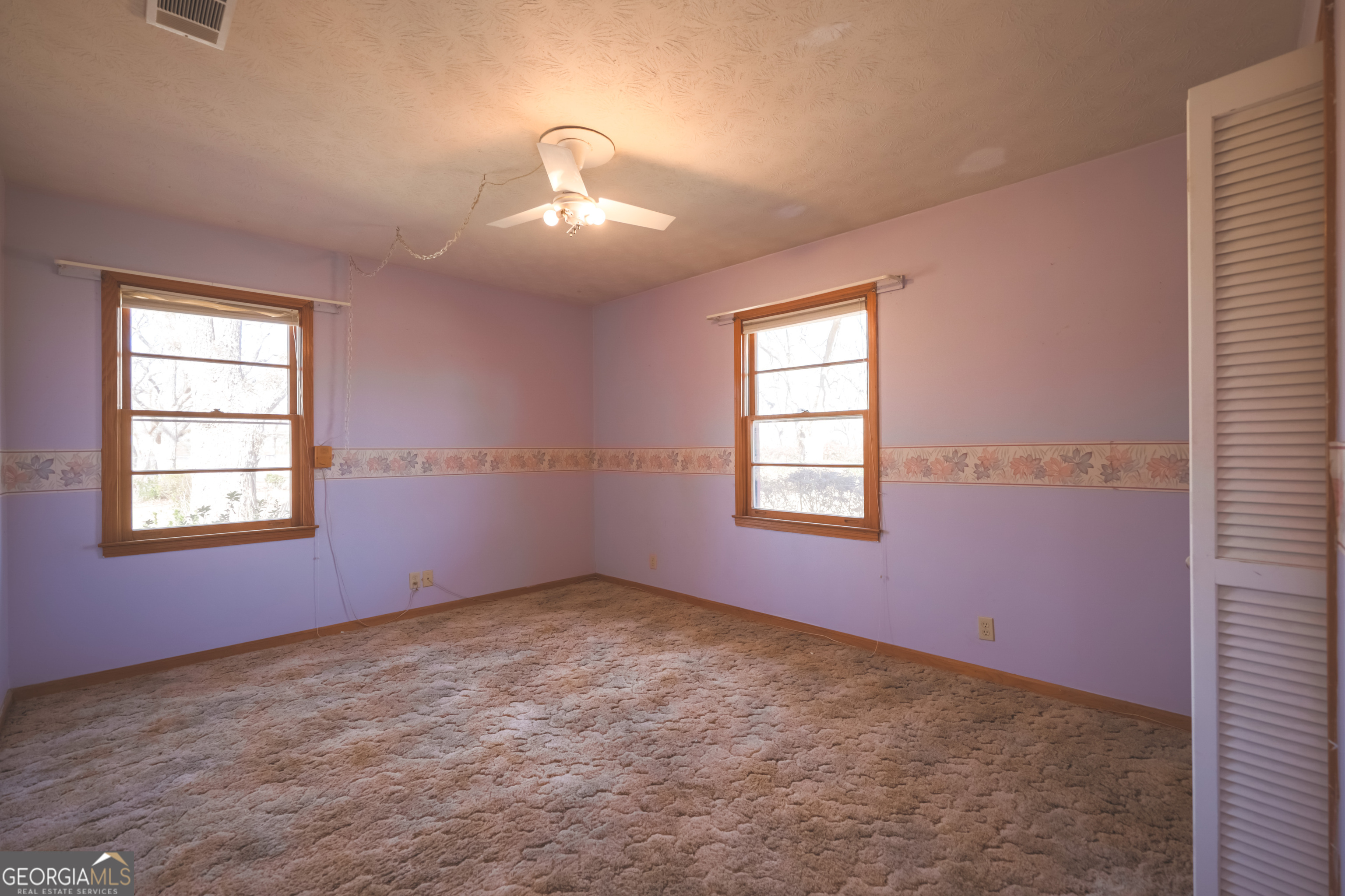 3111 Spatola Loop Blackshear, GA 31516 - Photo 18 of 23 an empty room with windows