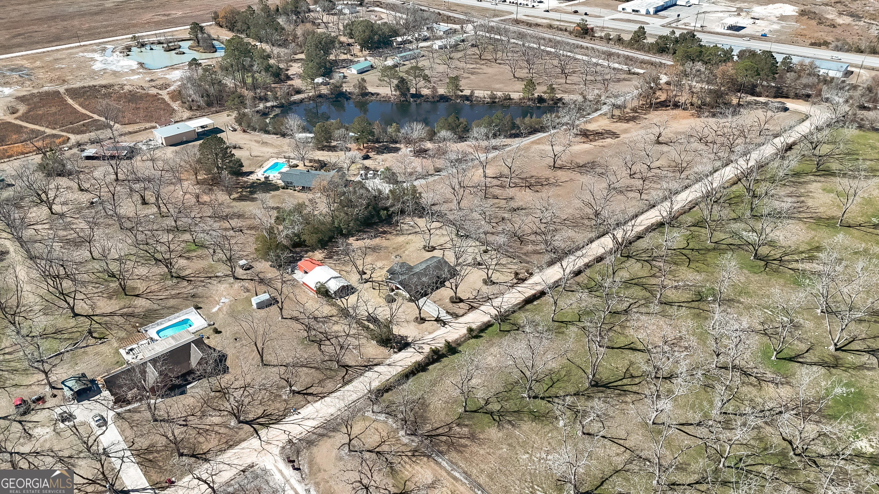 3111 Spatola Loop Blackshear, GA 31516 - Photo 22 of 23 a backyard of a house with a mountain