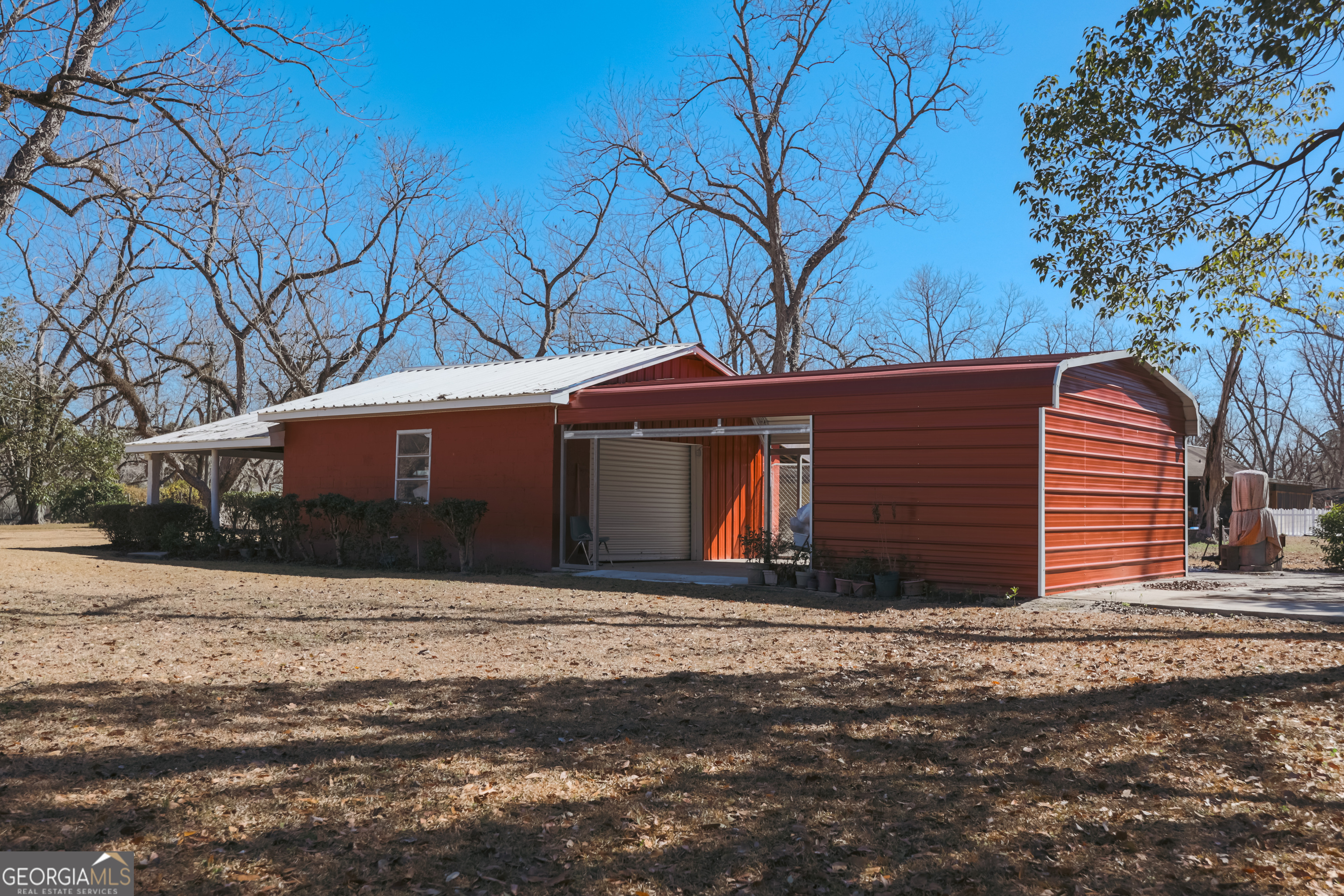 3111 Spatola Loop Blackshear, GA 31516 - Photo 3 of 23 a front view of a house with a yard
