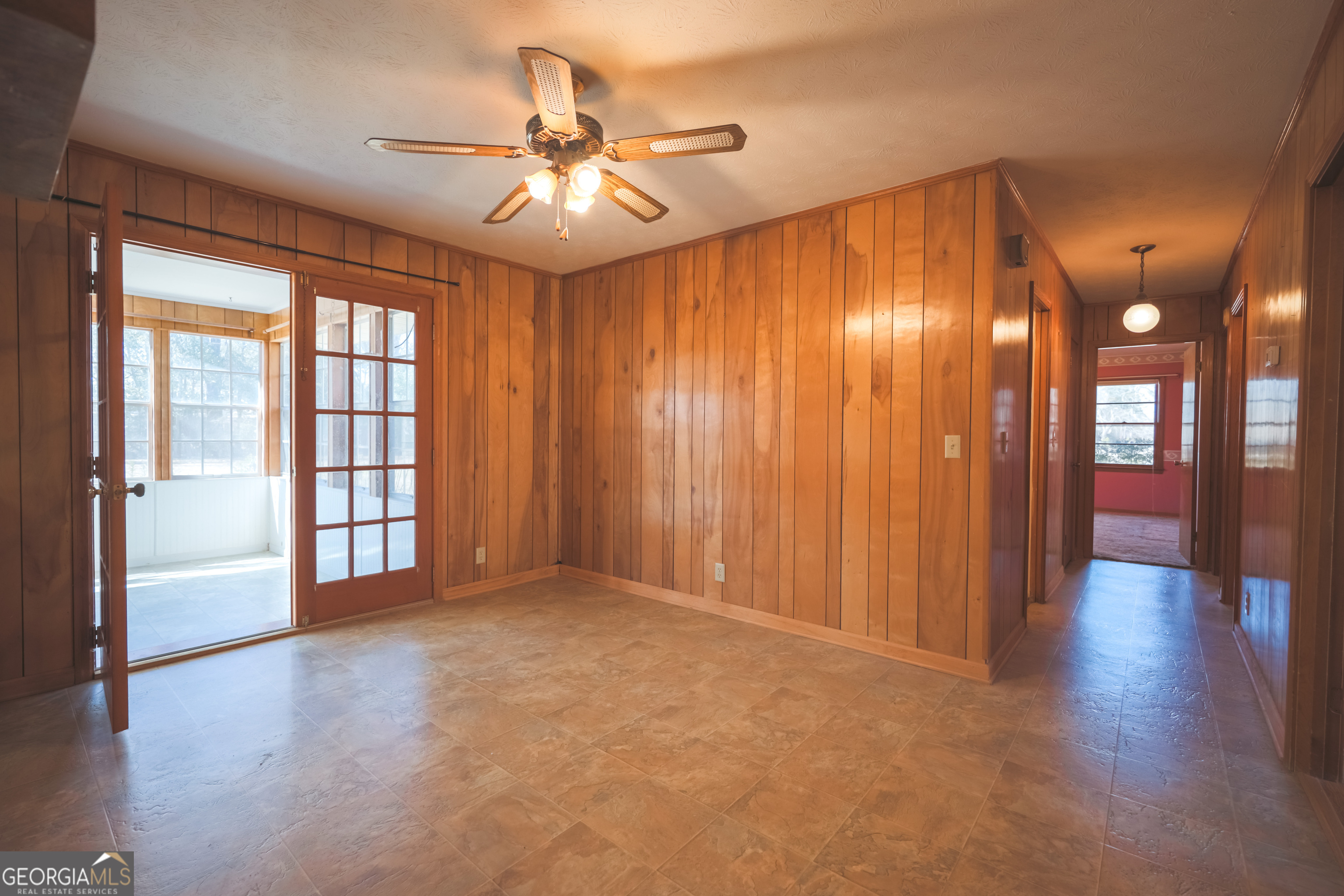 3111 Spatola Loop Blackshear, GA 31516 - Photo 9 of 23 a view of an empty room with a chandelier