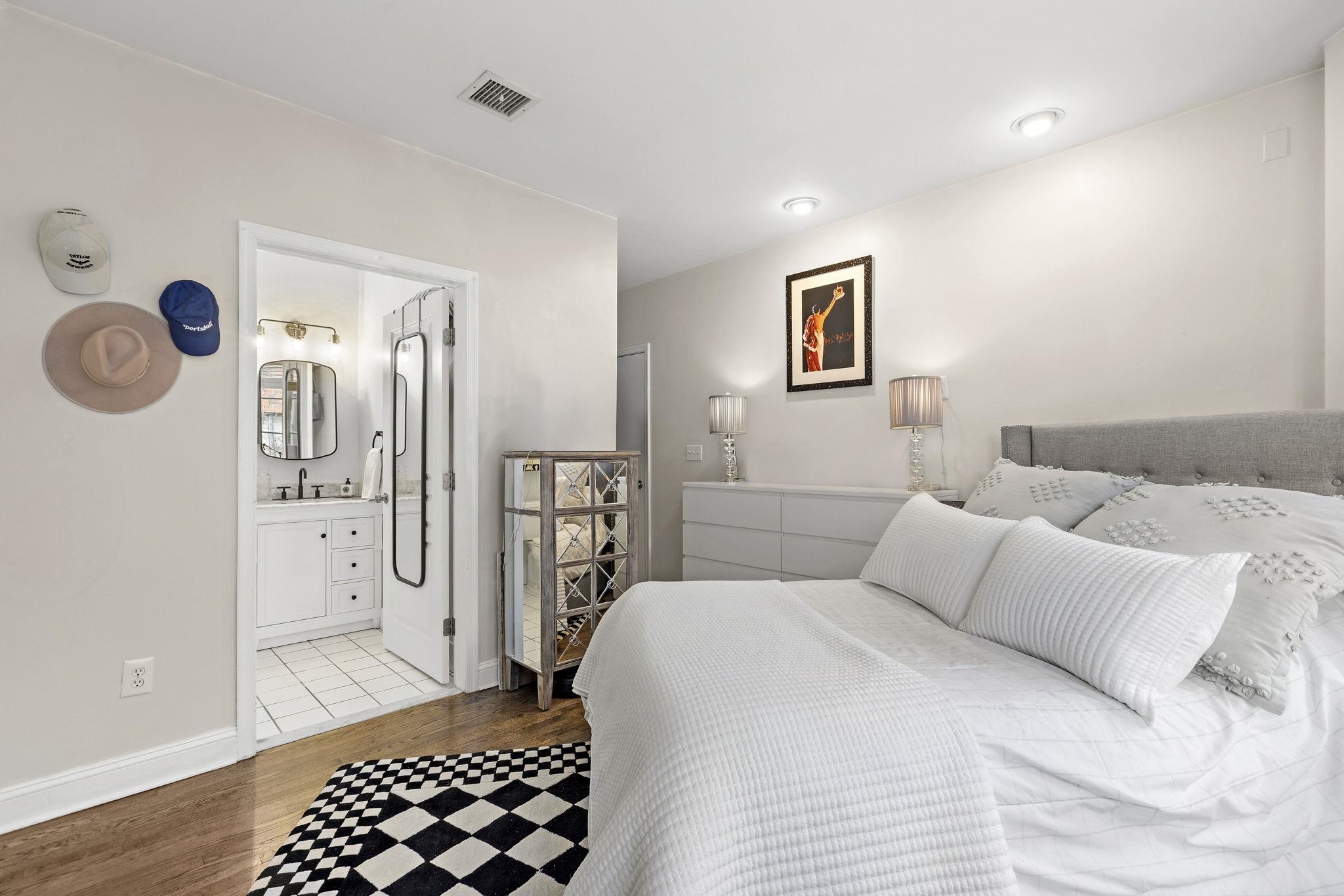 501 9th Street, Unit 309 Hoboken, NJ 07030 - Photo 13 of 18 a bedroom with a bed and a cabinets