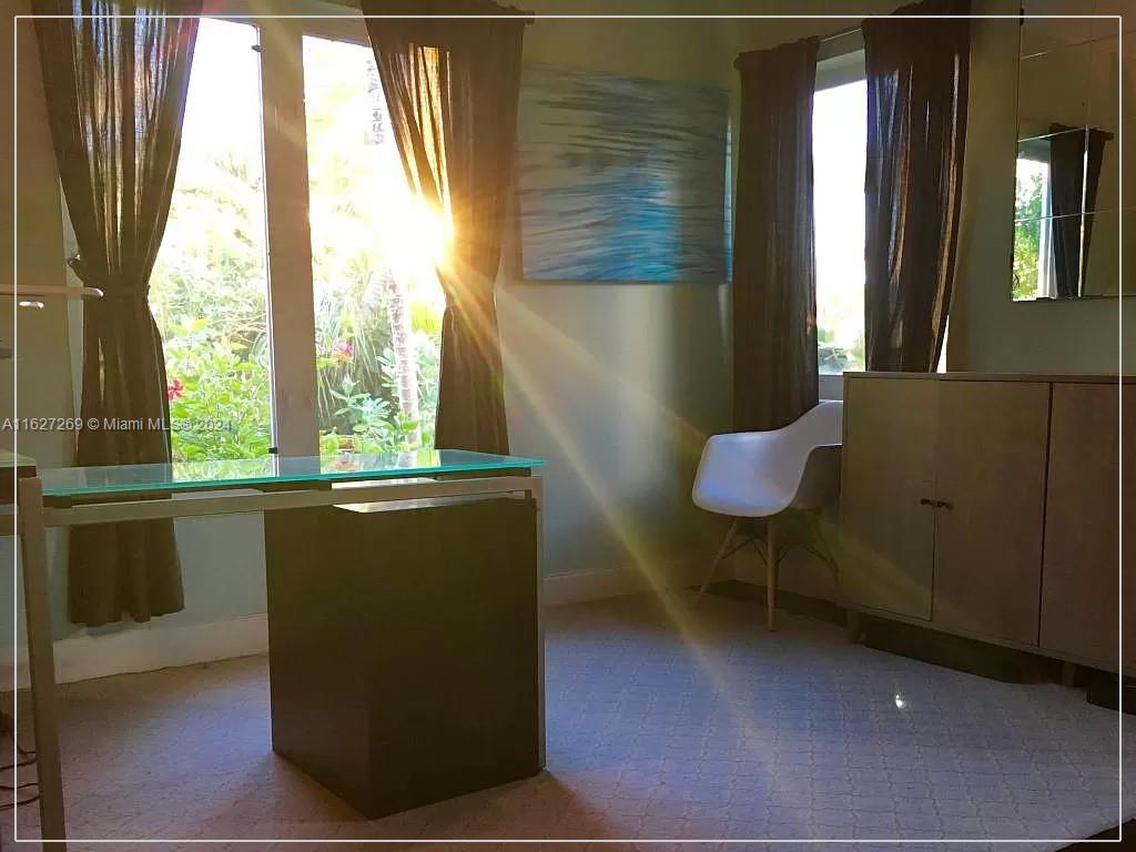 8818 Abbott Avenue Surfside, FL 33154 - Photo 14 of 28 a view of balcony and dining room