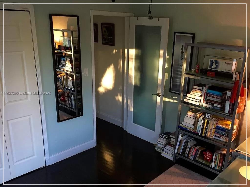 8818 Abbott Avenue Surfside, FL 33154 - Photo 15 of 28 an entryway with a wooden floor