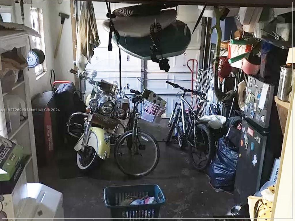 8818 Abbott Avenue Surfside, FL 33154 - Photo 23 of 28 a view of a closet with storage