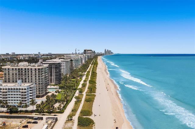 8818 Abbott Avenue Surfside, FL 33154 - Photo 24 of 28 a view of building with yard