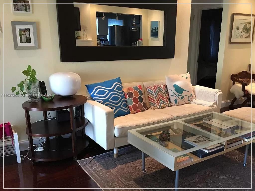 8818 Abbott Avenue Surfside, FL 33154 - Photo 4 of 28 a living room with furniture and wooden floor