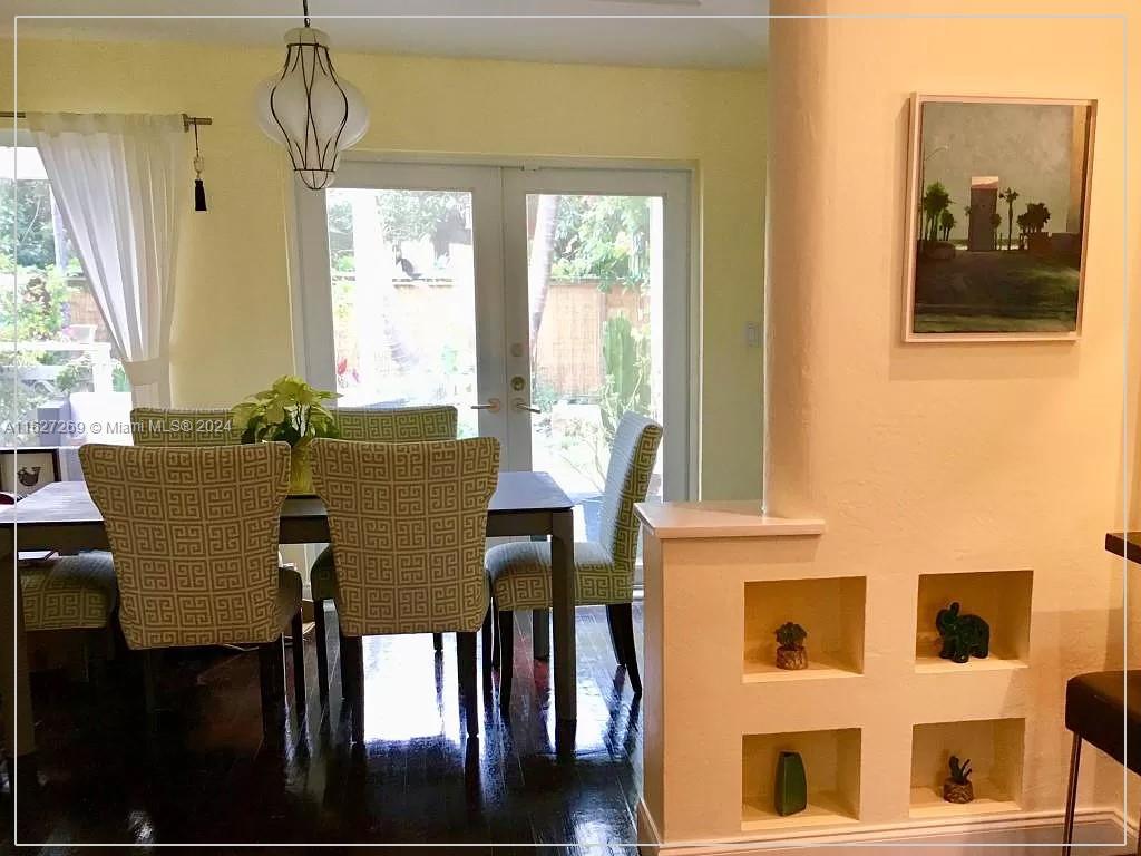 8818 Abbott Avenue Surfside, FL 33154 - Photo 10 of 28 a view of a dining room with furniture and window