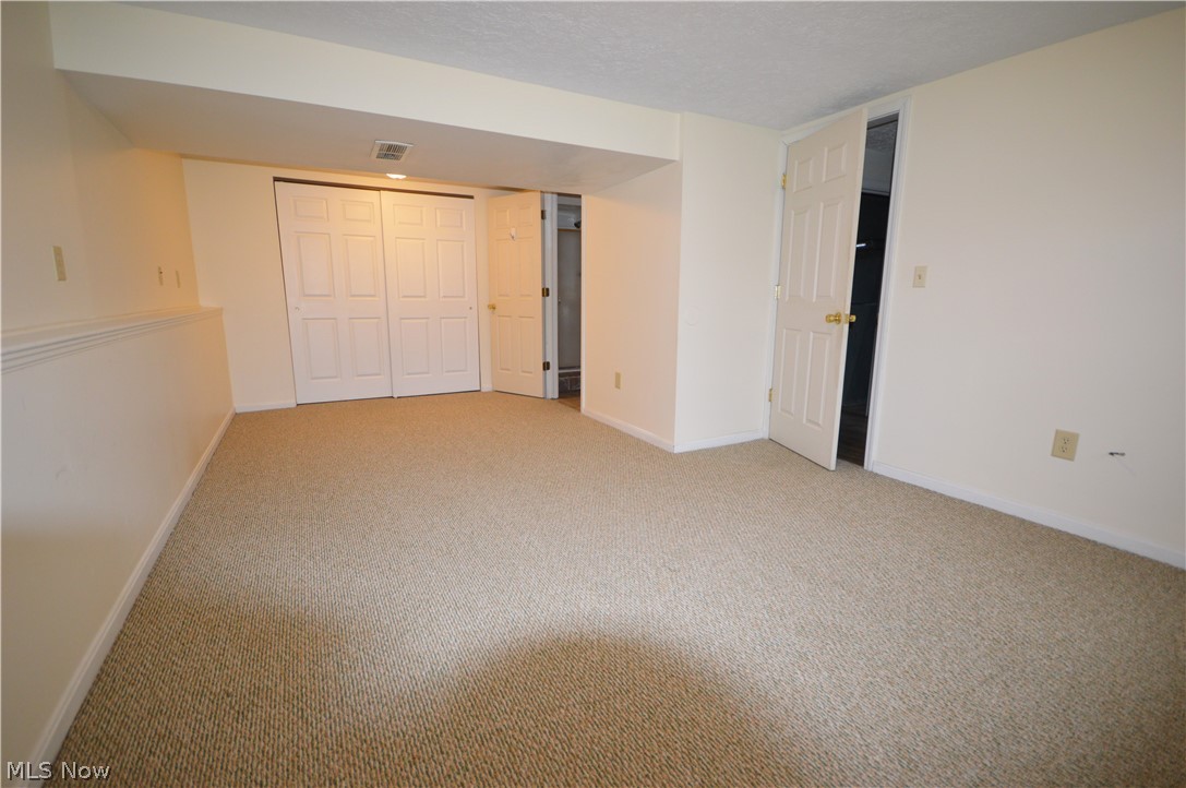 1694 Orkney Road Madison, OH 44057 - Photo 7 of 14 Lower level (Master Bedroom option with full Bath) or Family Room.
