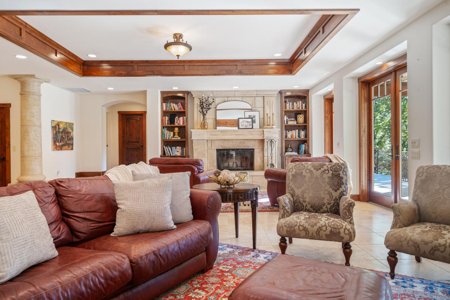4581 Highway 4 Murphys, CA 95247 - Photo 21 of 65 a living room with furniture a fireplace and a large window
