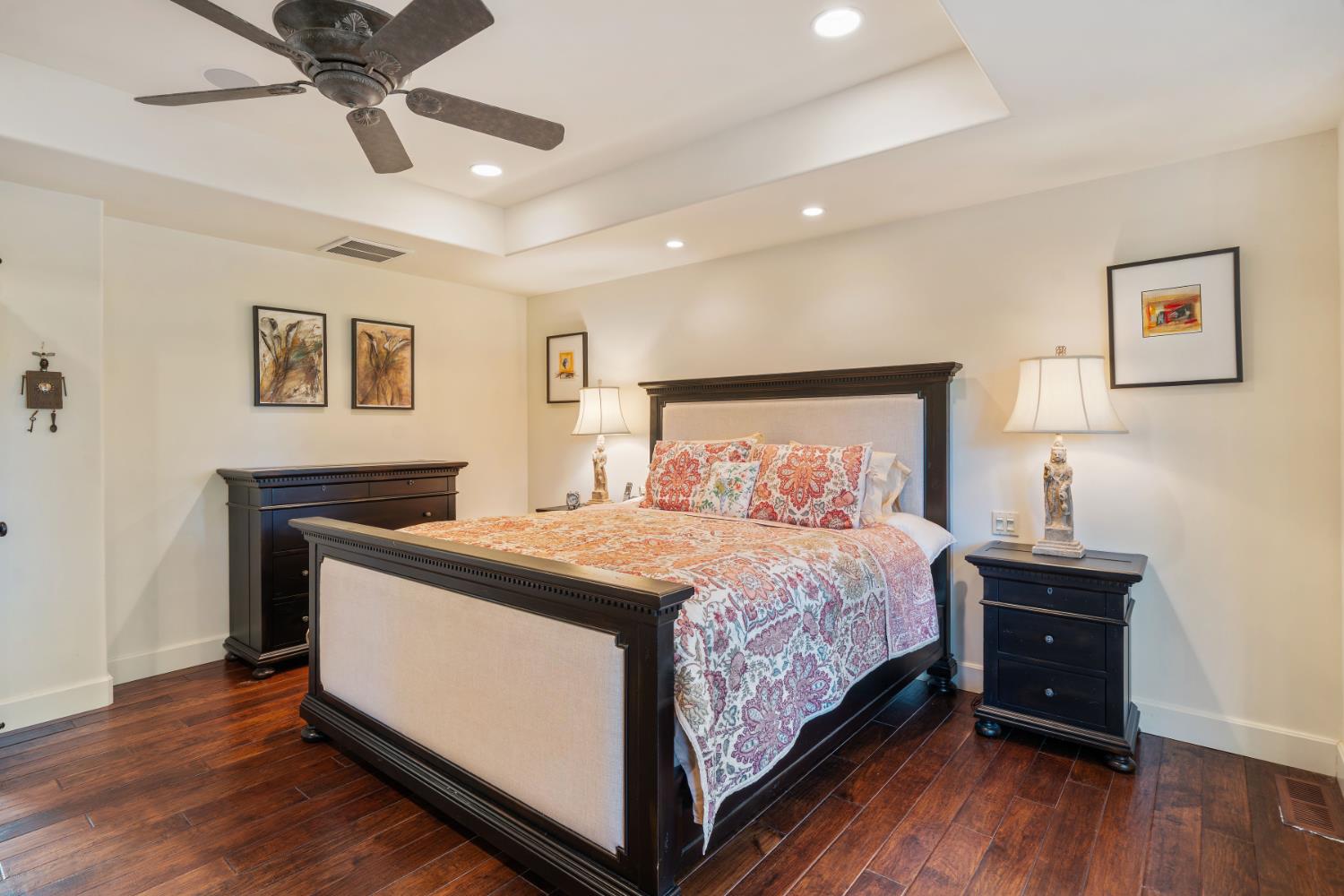 4581 Highway 4 Murphys, CA 95247 - Photo 27 of 58 a bedroom with a bed and wooden floor