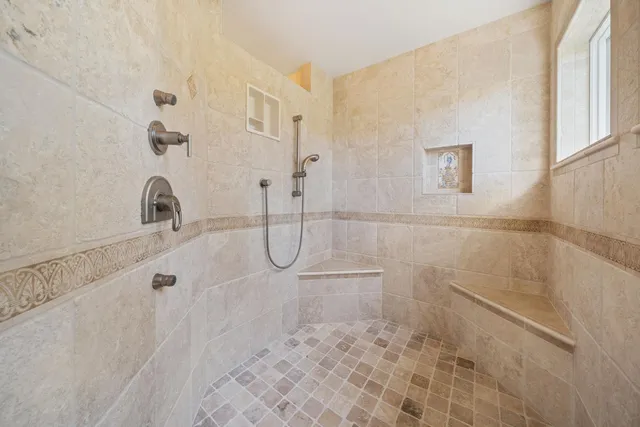 a living room with furniture and a rug