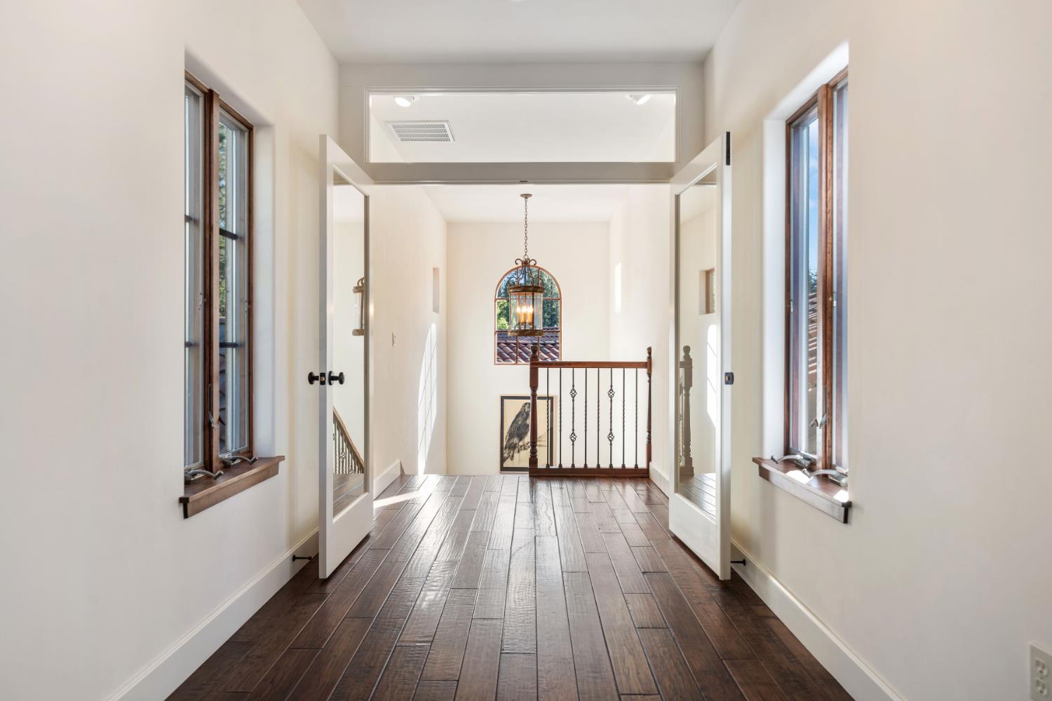 4581 Highway 4 Murphys, CA 95247 - Photo 42 of 58 a view of a hallway with wooden floor and stairs
