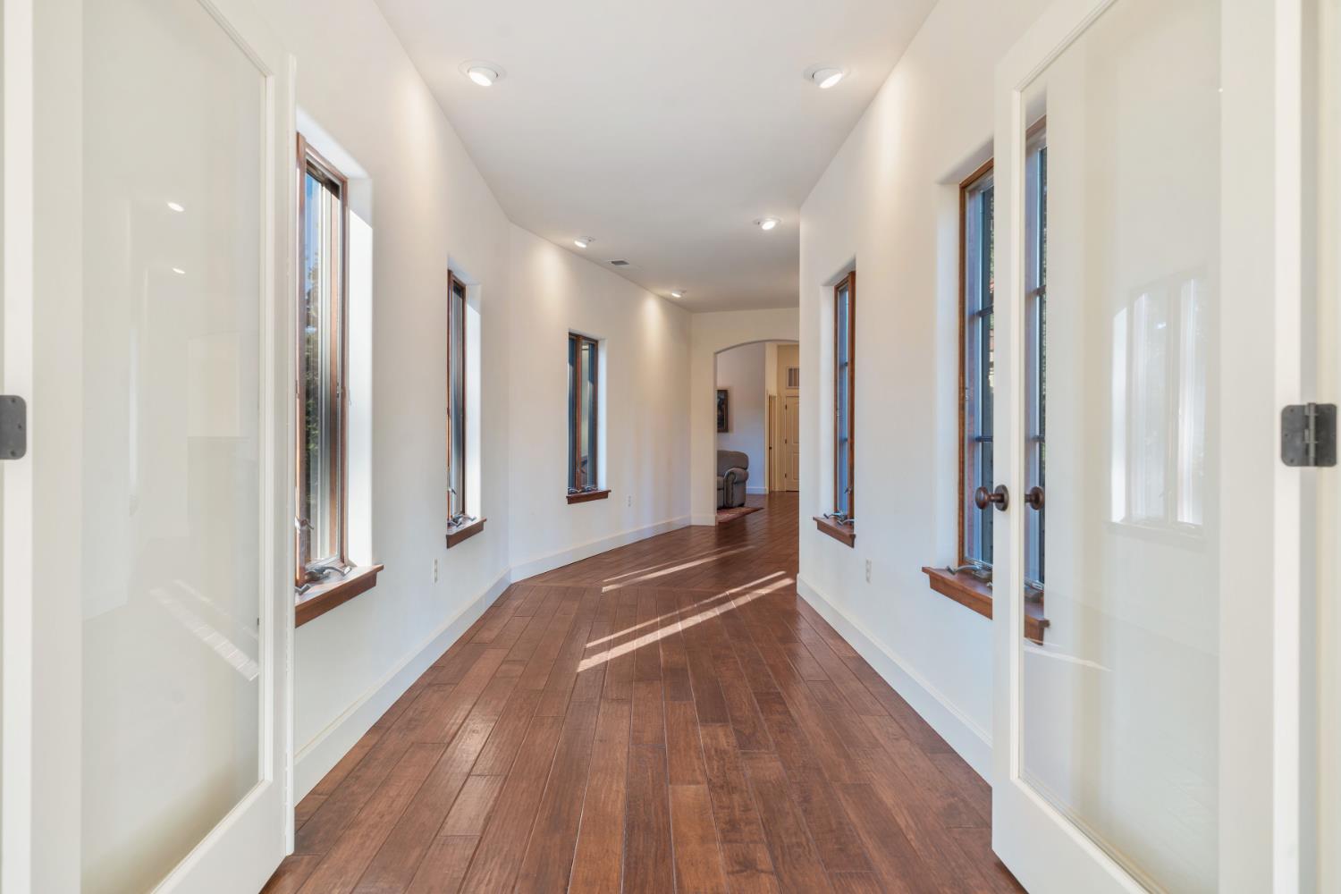4581 Highway 4 Murphys, CA 95247 - Photo 44 of 65 a view of a hallway with wooden floor