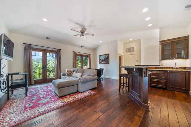 an aerial view of a house with outdoor space