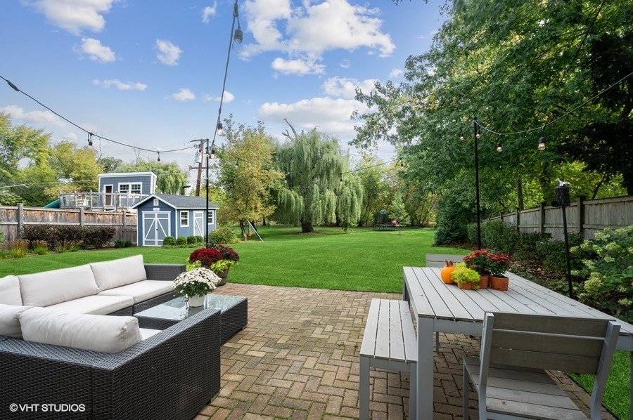 111 Riverside Drive Northfield, IL 60093 - Photo 25 of 33 a view of yard with patio