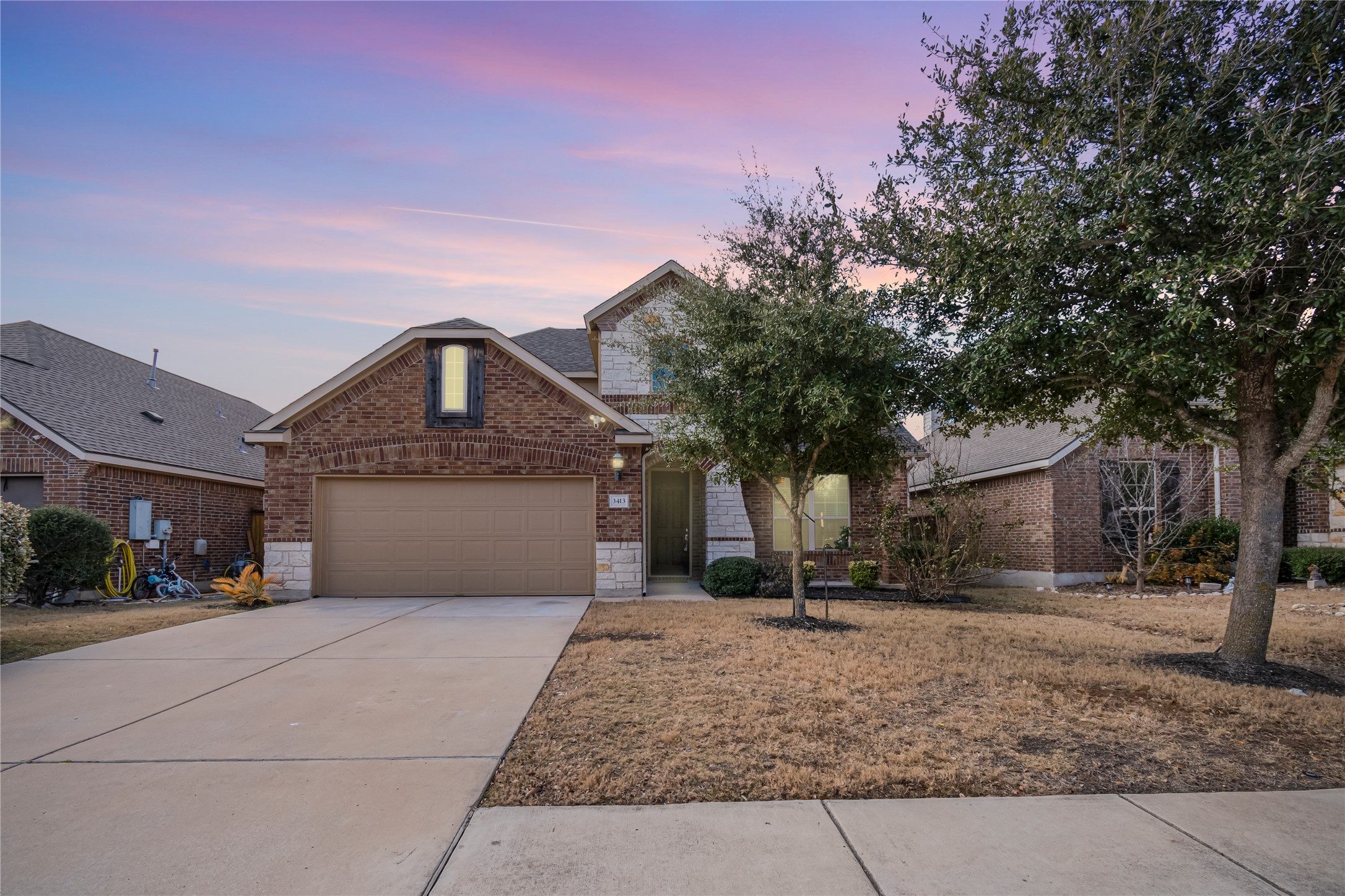 3413 Grail Hollows Road Pflugerville, TX 78660 - Photo 1 of 36 front view of a house with a yard