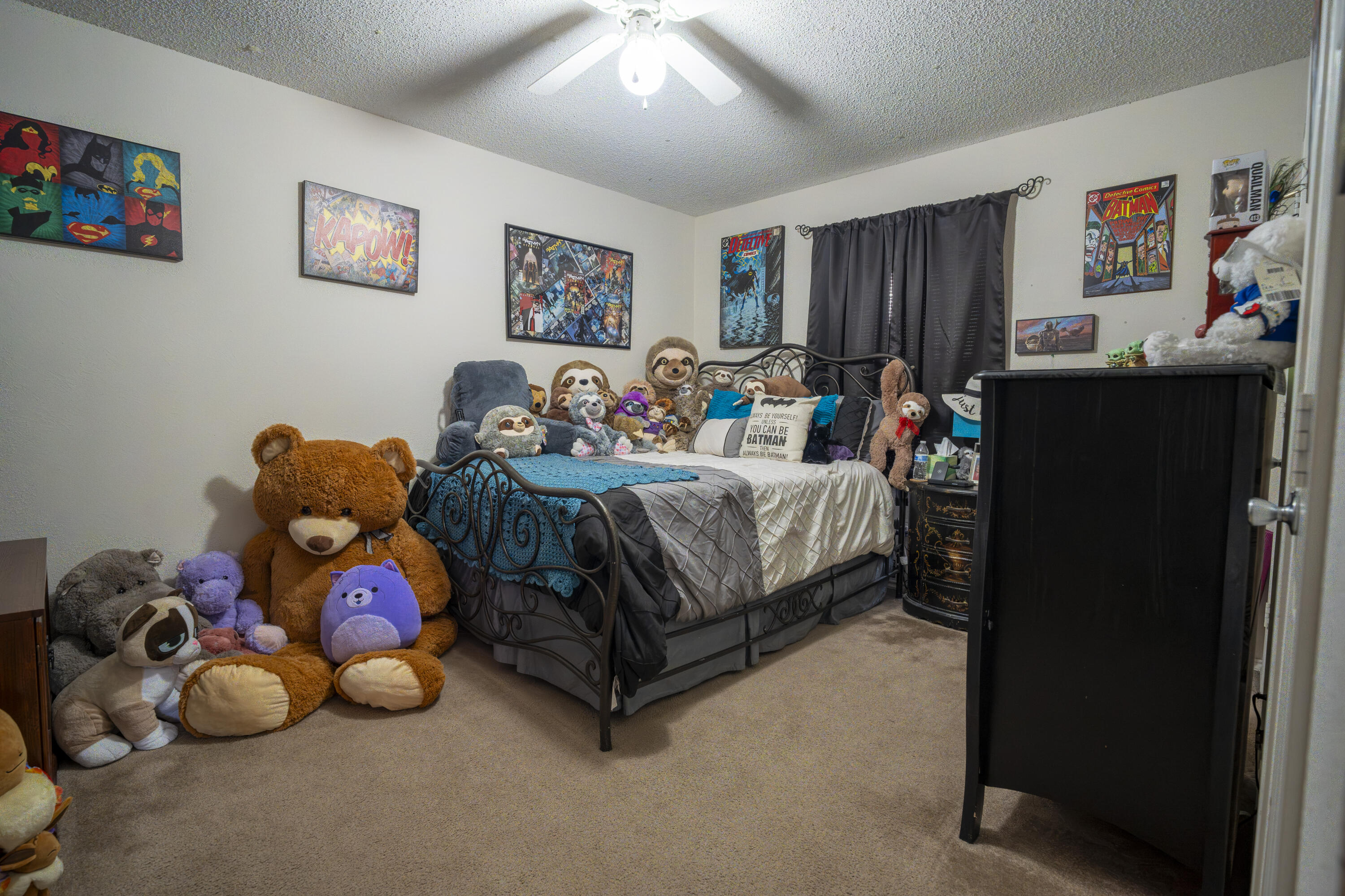 6319 13th Street Lubbock, TX 79416 - Photo 11 of 21 a bedroom with bed and a large mirror