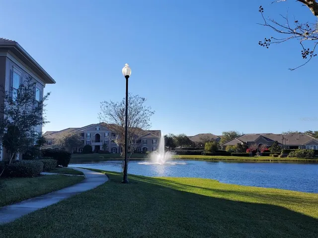 a aerial view of a house with a big yard