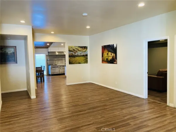 a room with furniture and a wooden floor