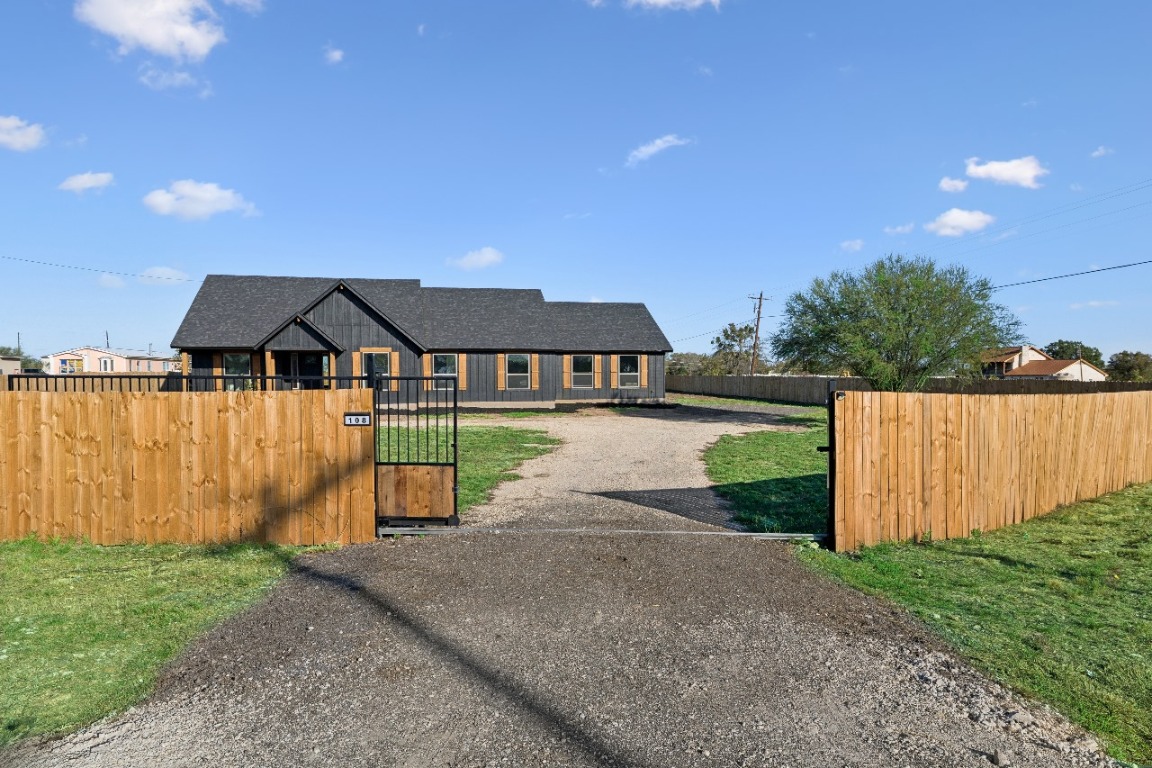 108 Santa Teresa Road Kyle, TX 78640 - Photo 2 of 26 a view of swimming pool with an outdoor space and seating area
