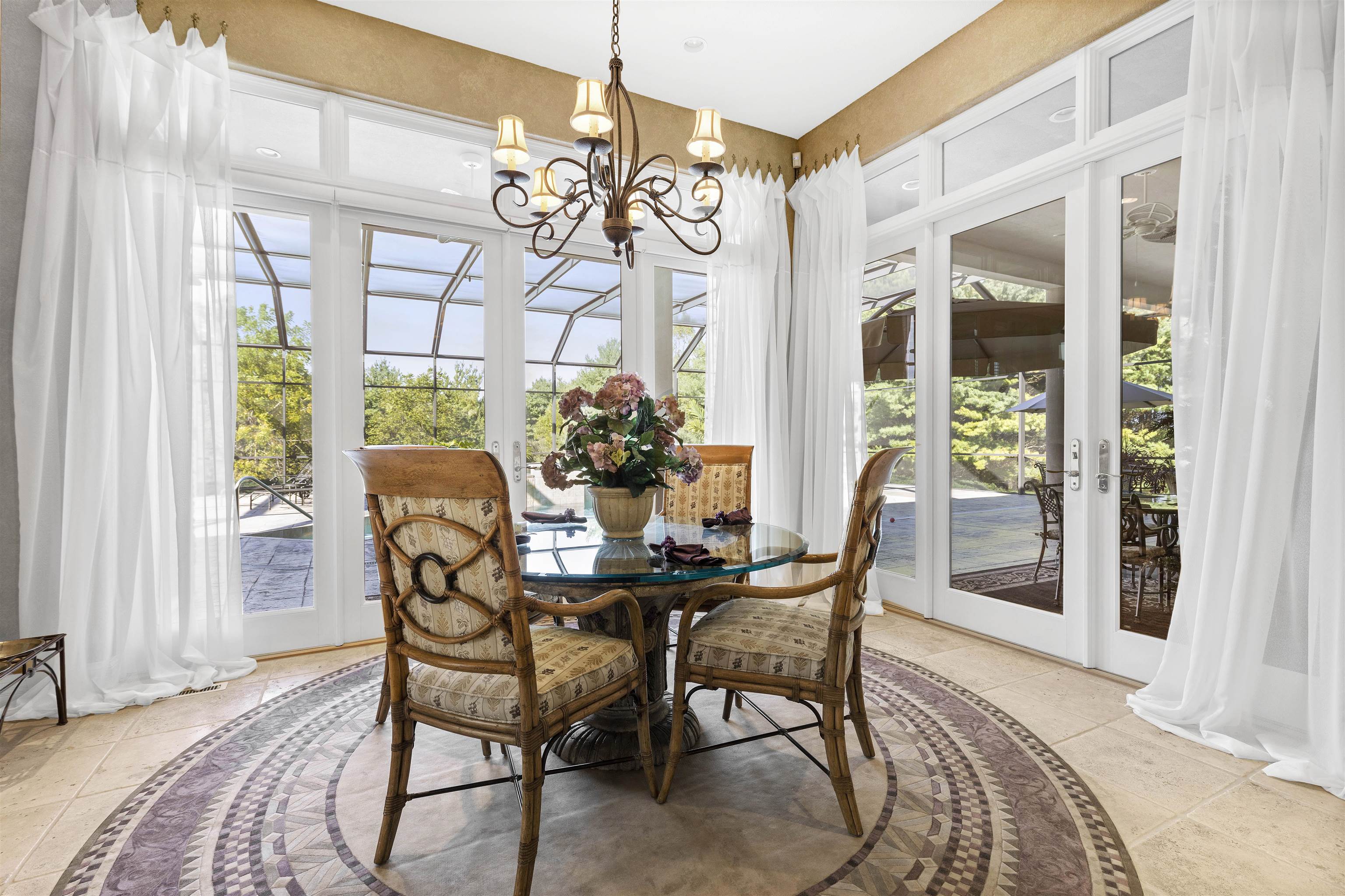 17278 Laube Road Davis, IL 61019 - Photo 16 of 97 a dining room with furniture a chandelier and wooden floor