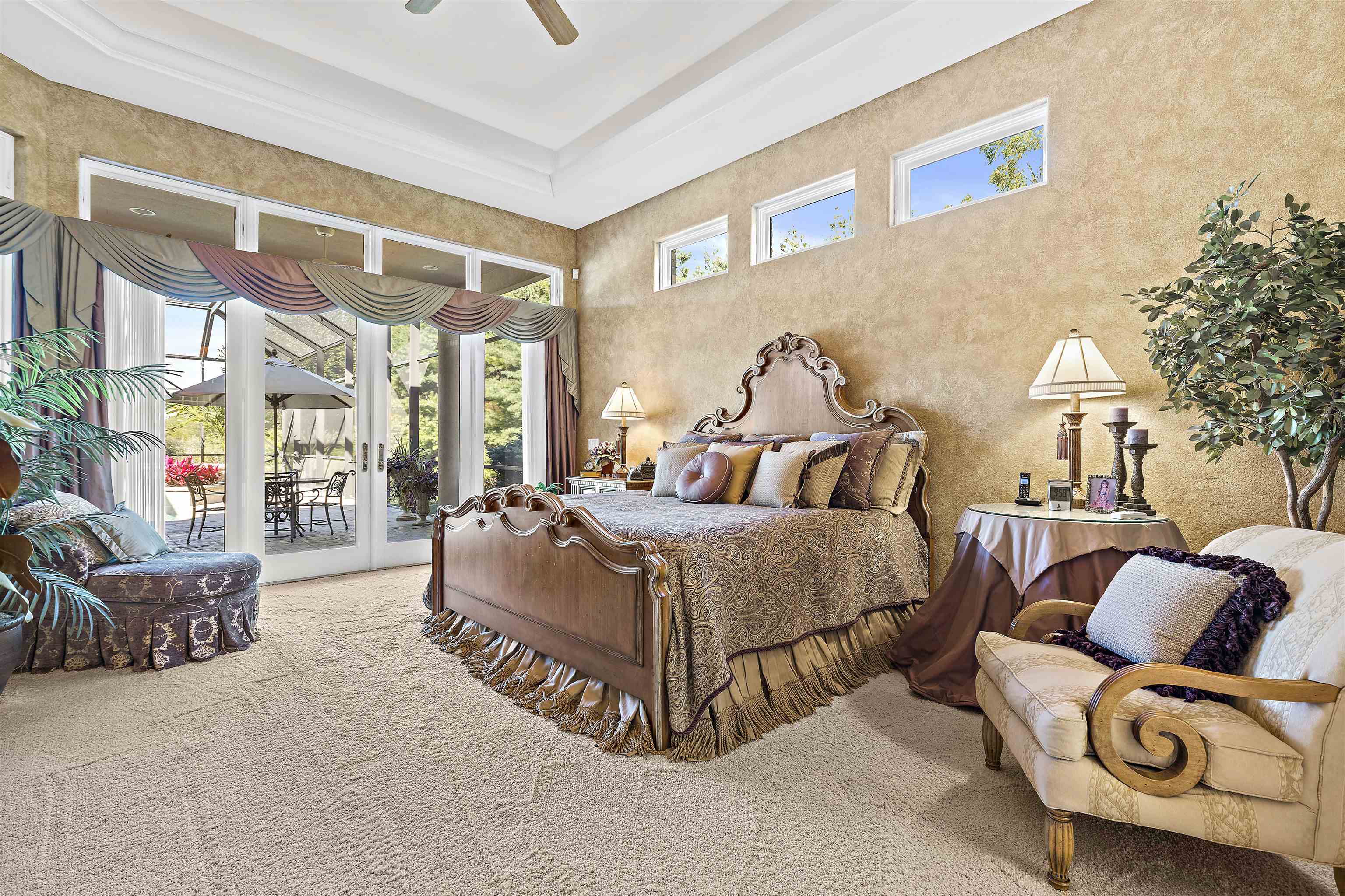 17278 Laube Road Davis, IL 61019 - Photo 19 of 97 a spacious bedroom with a bed and a couch