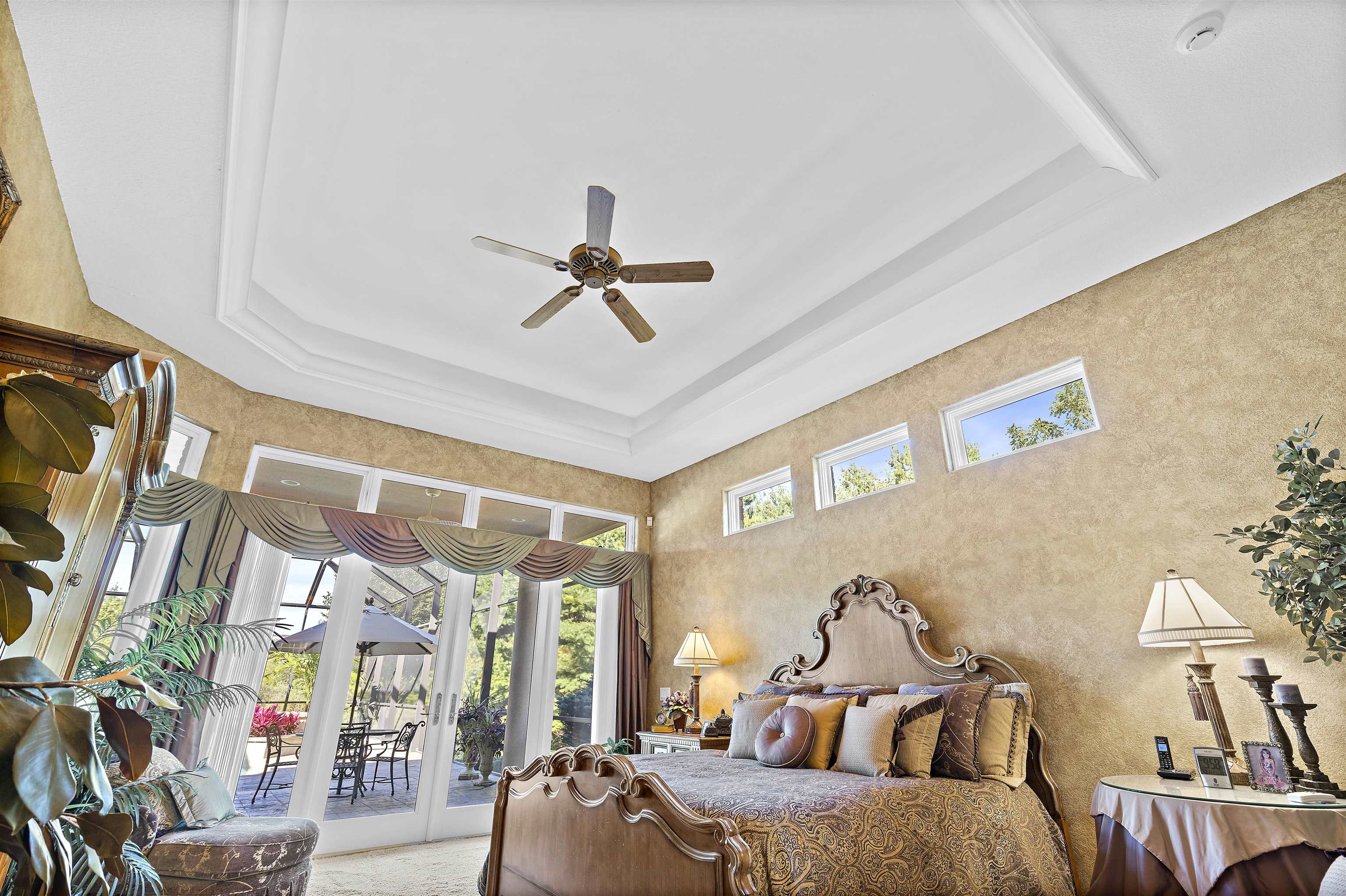 17278 Laube Road Davis, IL 61019 - Photo 20 of 97 a bedroom with a bed and a chandelier