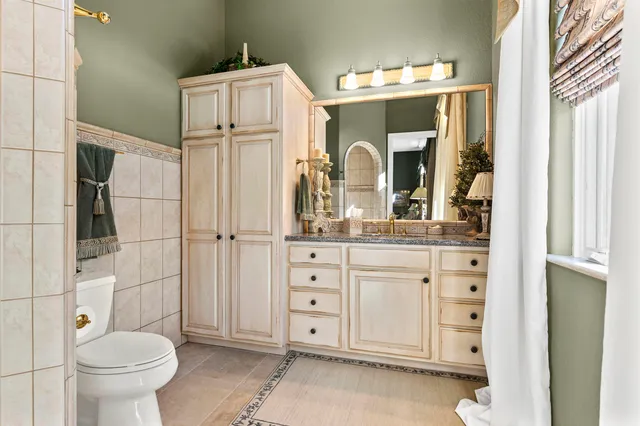 a view of parking garage with cars