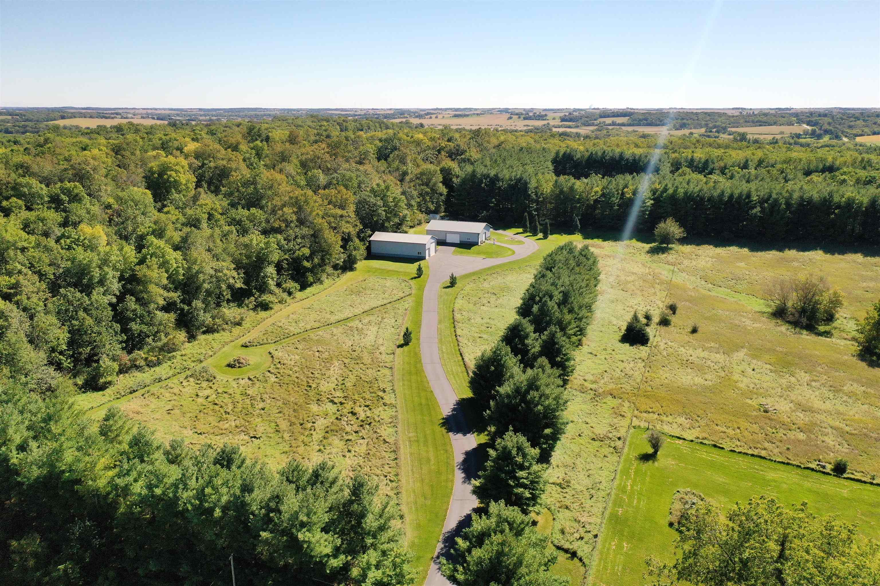 17278 Laube Road Davis, IL 61019 - Photo 85 of 97 a view of a lake with a yard