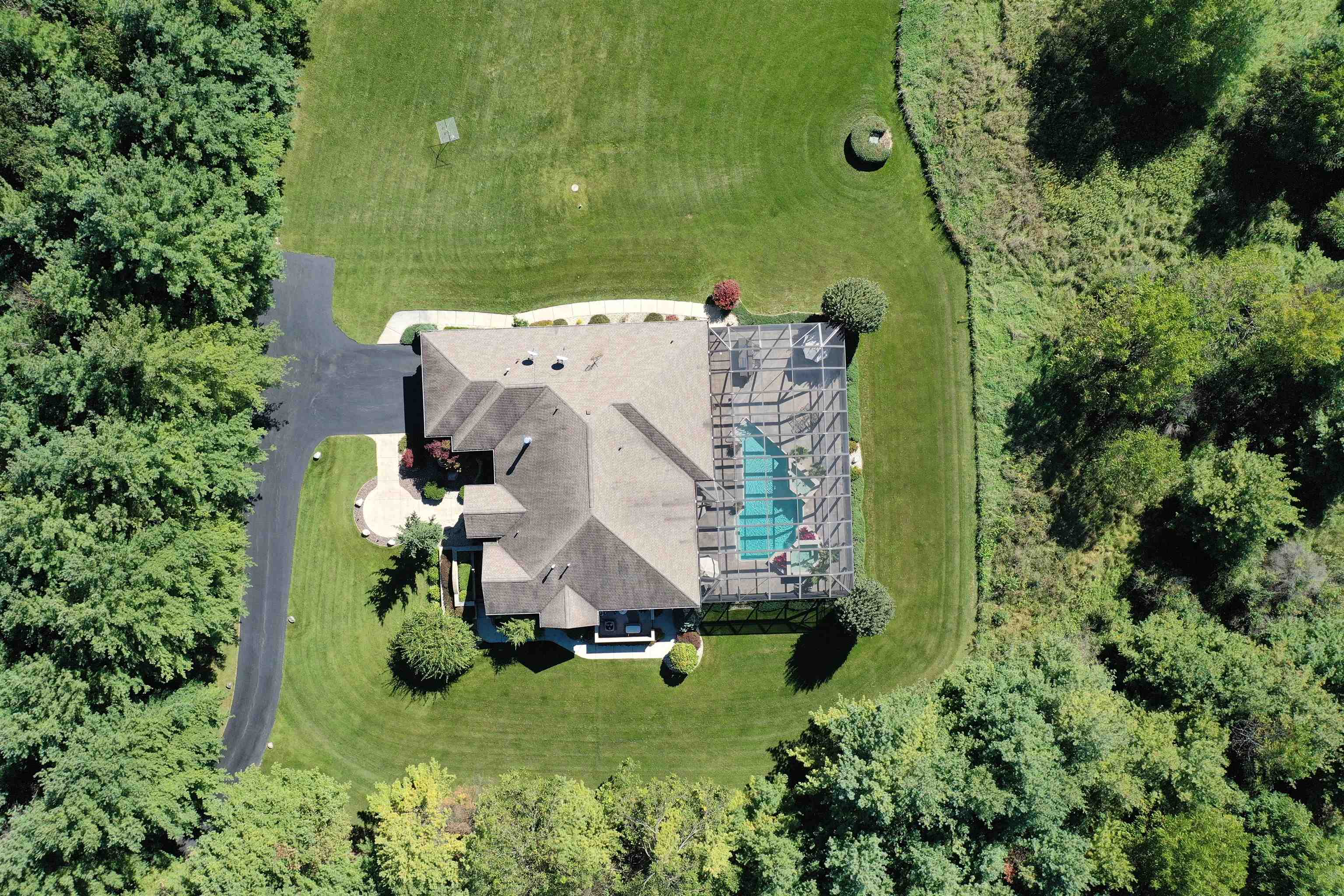 17278 Laube Road Davis, IL 61019 - Photo 86 of 97 an aerial view of a house with a yard