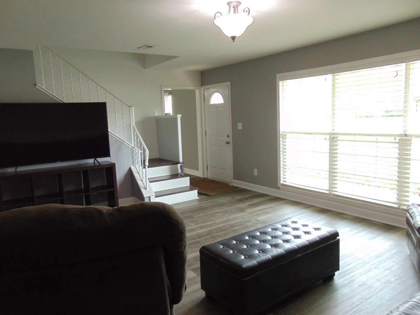 307 North Raven Road Shorewood, IL 60404 - Photo 11 of 22 a living room with furniture and a flat screen tv