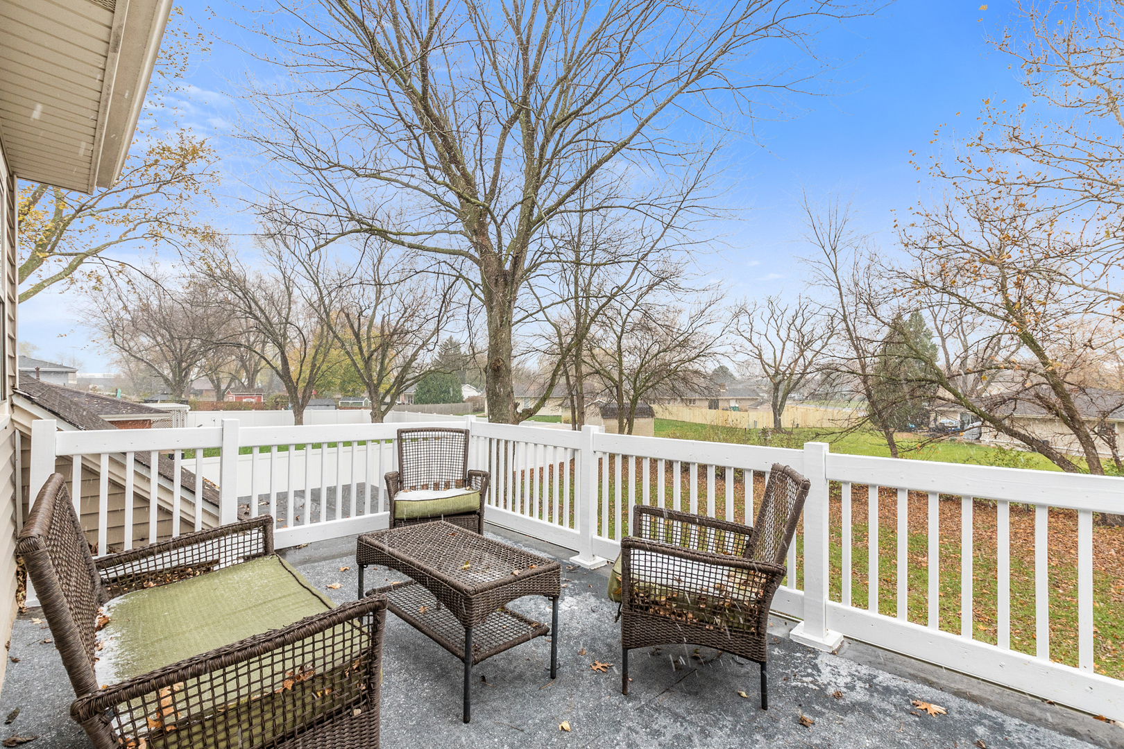 307 North Raven Road Shorewood, IL 60404 - Photo 4 of 22 a view of a chair and table in the deck