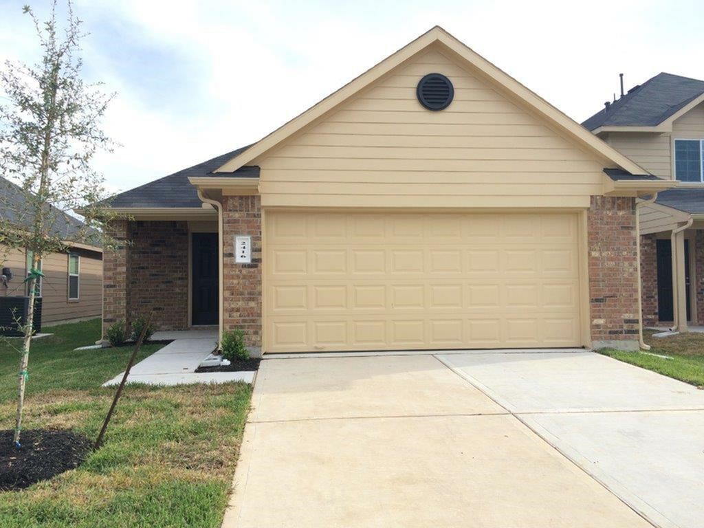 a front view of house with garage