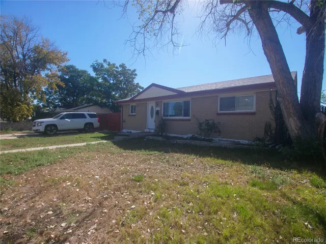 a house view with a garden space