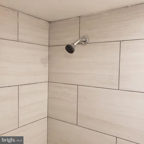 a view of a room with rack on the wall