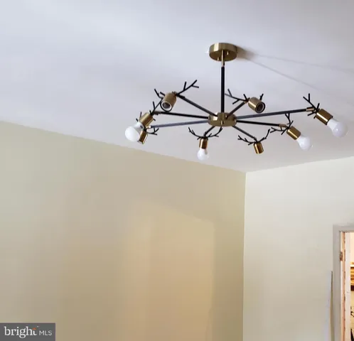 a room with furniture and wooden floor