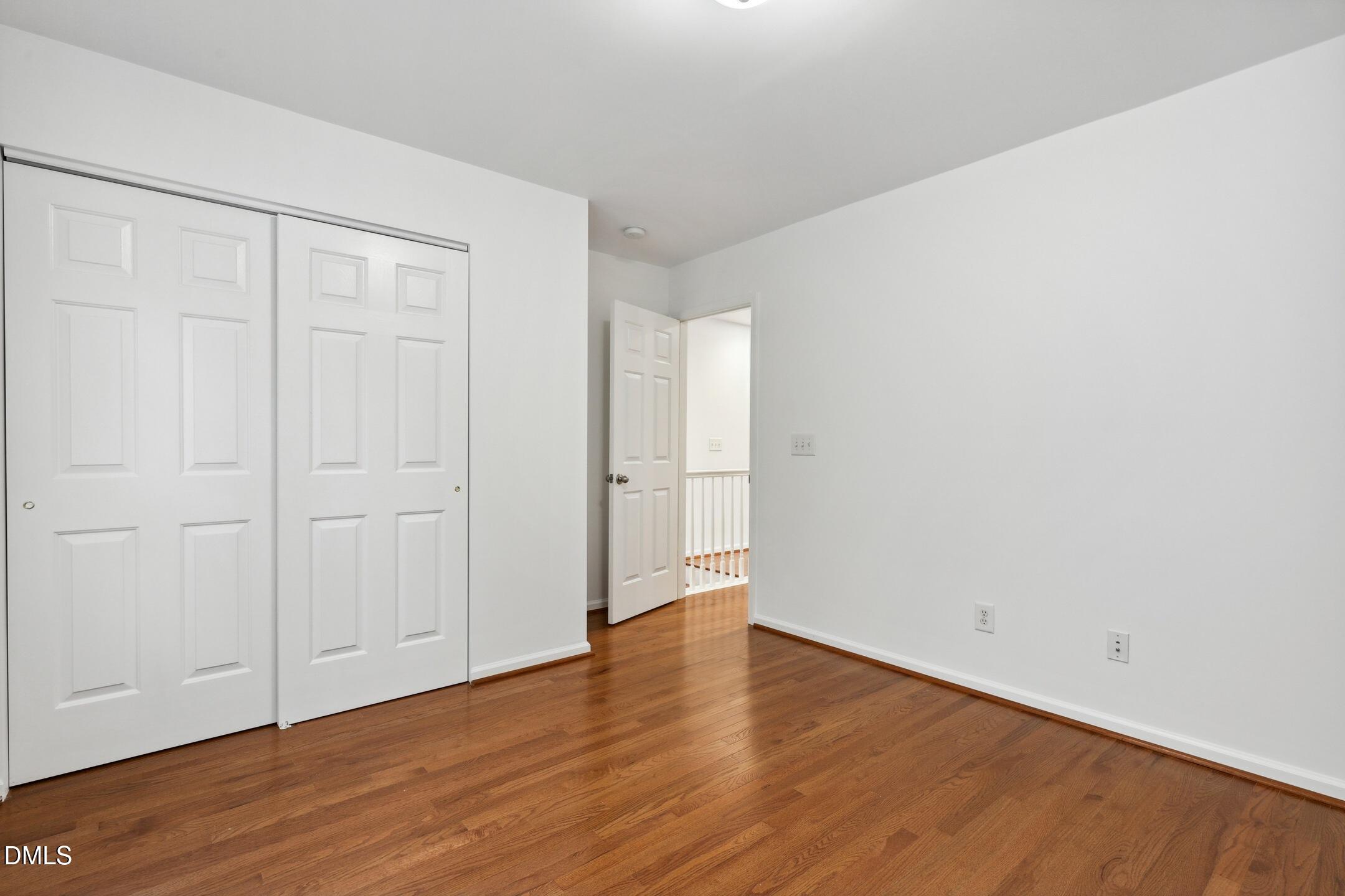 3141 Rapid Falls Road Cary, NC 27519 - Photo 23 of 28 a view of an empty room with wooden floor