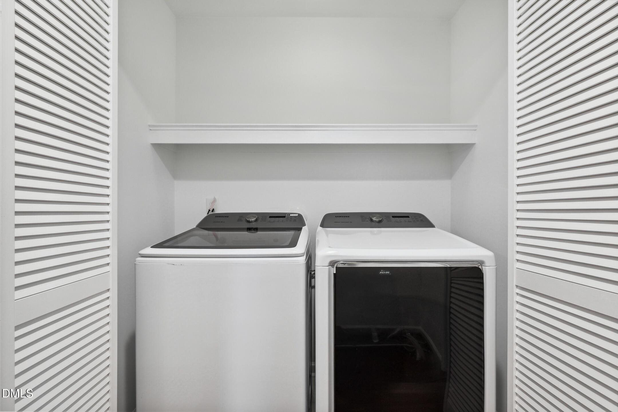 3141 Rapid Falls Road Cary, NC 27519 - Photo 25 of 28 a utility room with dryer and washer