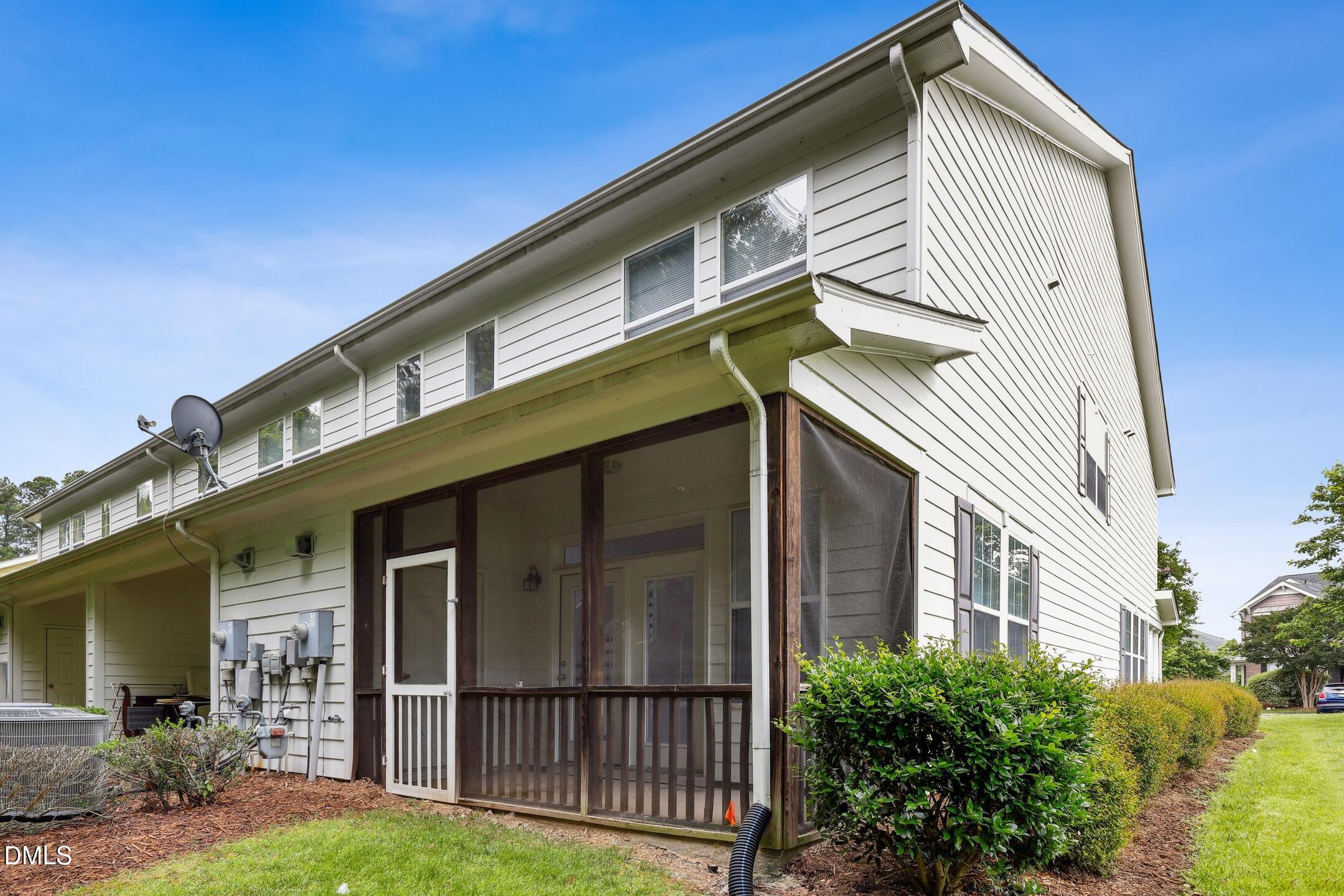 3141 Rapid Falls Road Cary, NC 27519 - Photo 26 of 28 a front view of a house with a yard