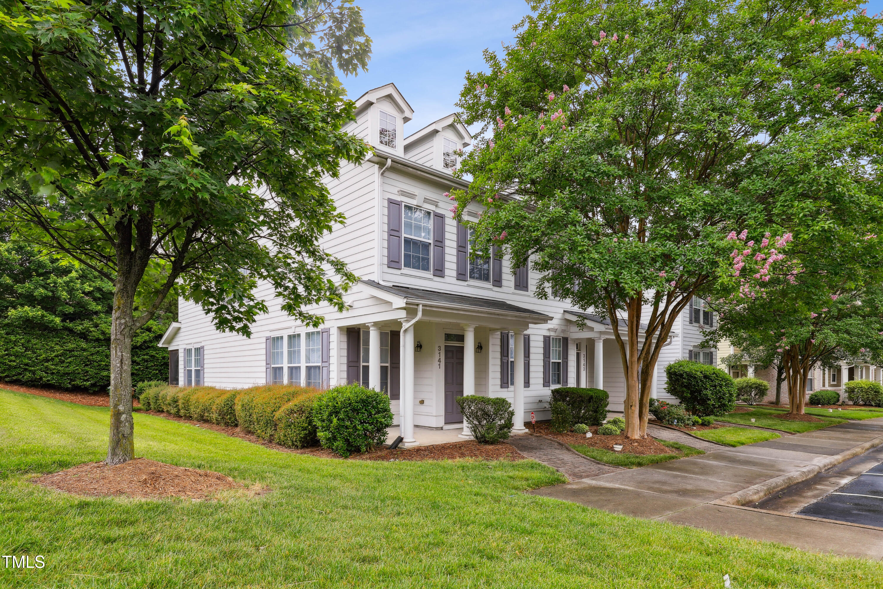 3141 Rapid Falls Road Cary, NC 27519 - Photo 3 of 28 a front view of a house with a yard