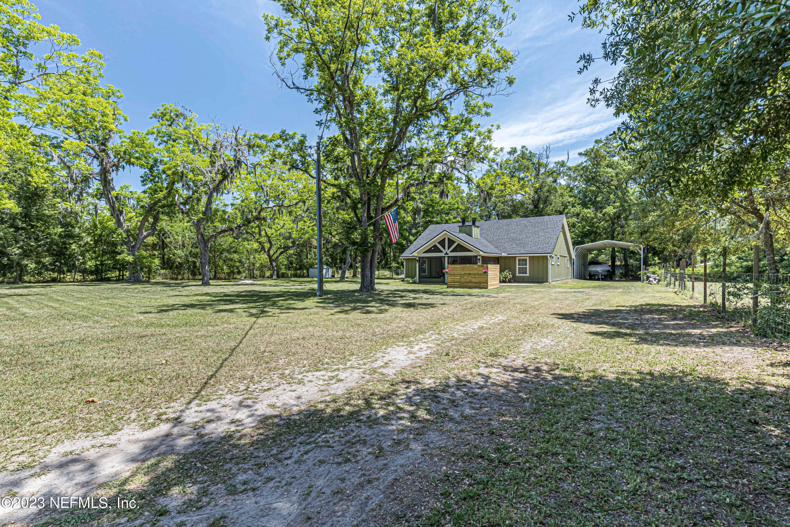 1199 Hatcher Road Middleburg, FL 32068 - Photo 15 of 55 a house view with a outdoor space