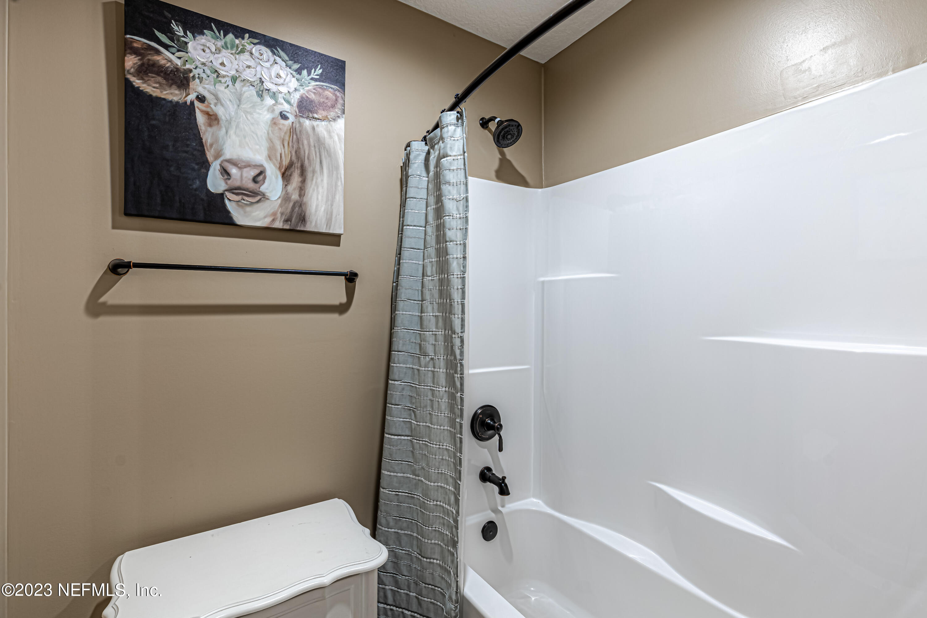 1199 Hatcher Road Middleburg, FL 32068 - Photo 38 of 55 a bathroom with a toilet and a shower