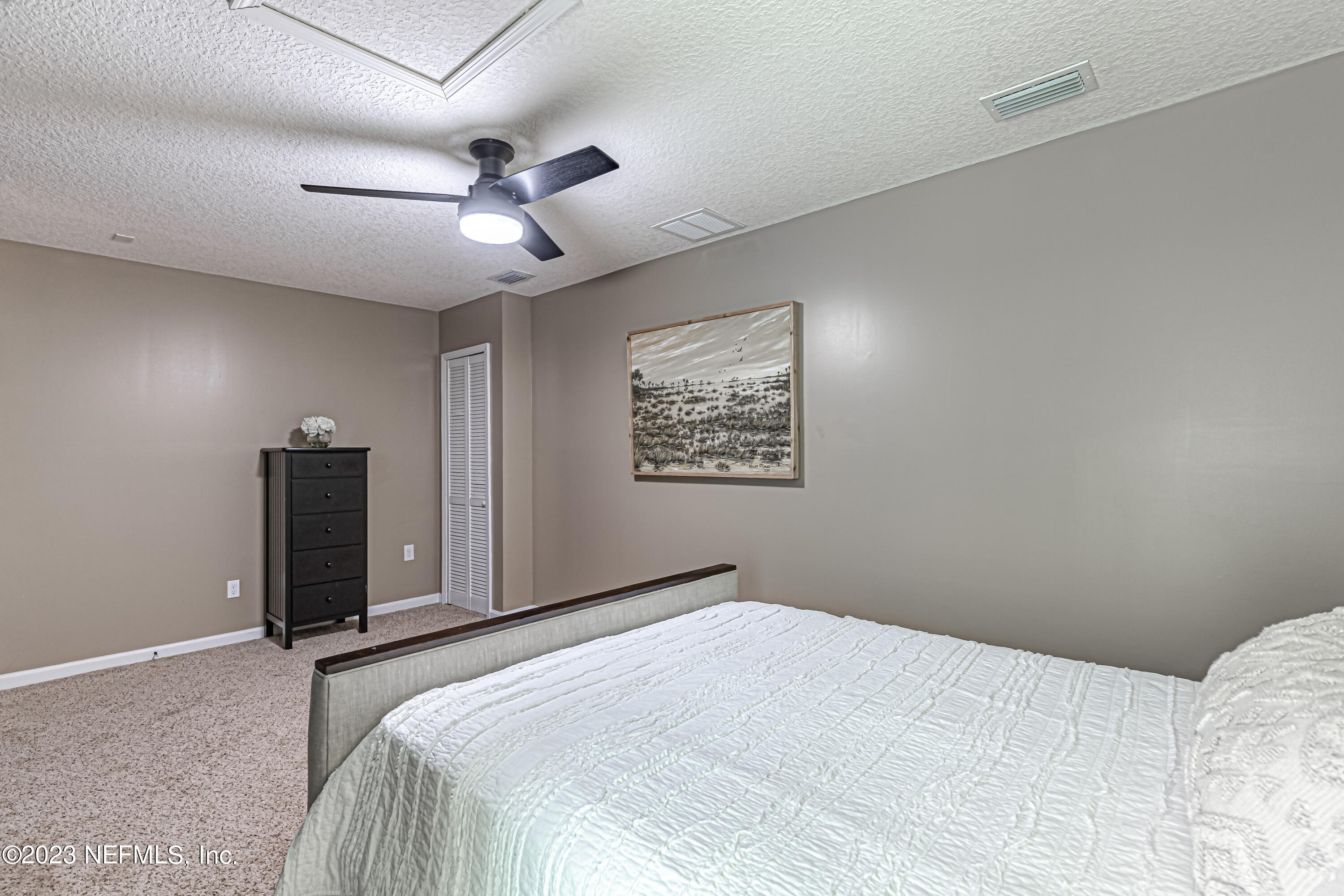 1199 Hatcher Road Middleburg, FL 32068 - Photo 41 of 55 a bedroom with bed and a ceiling fan