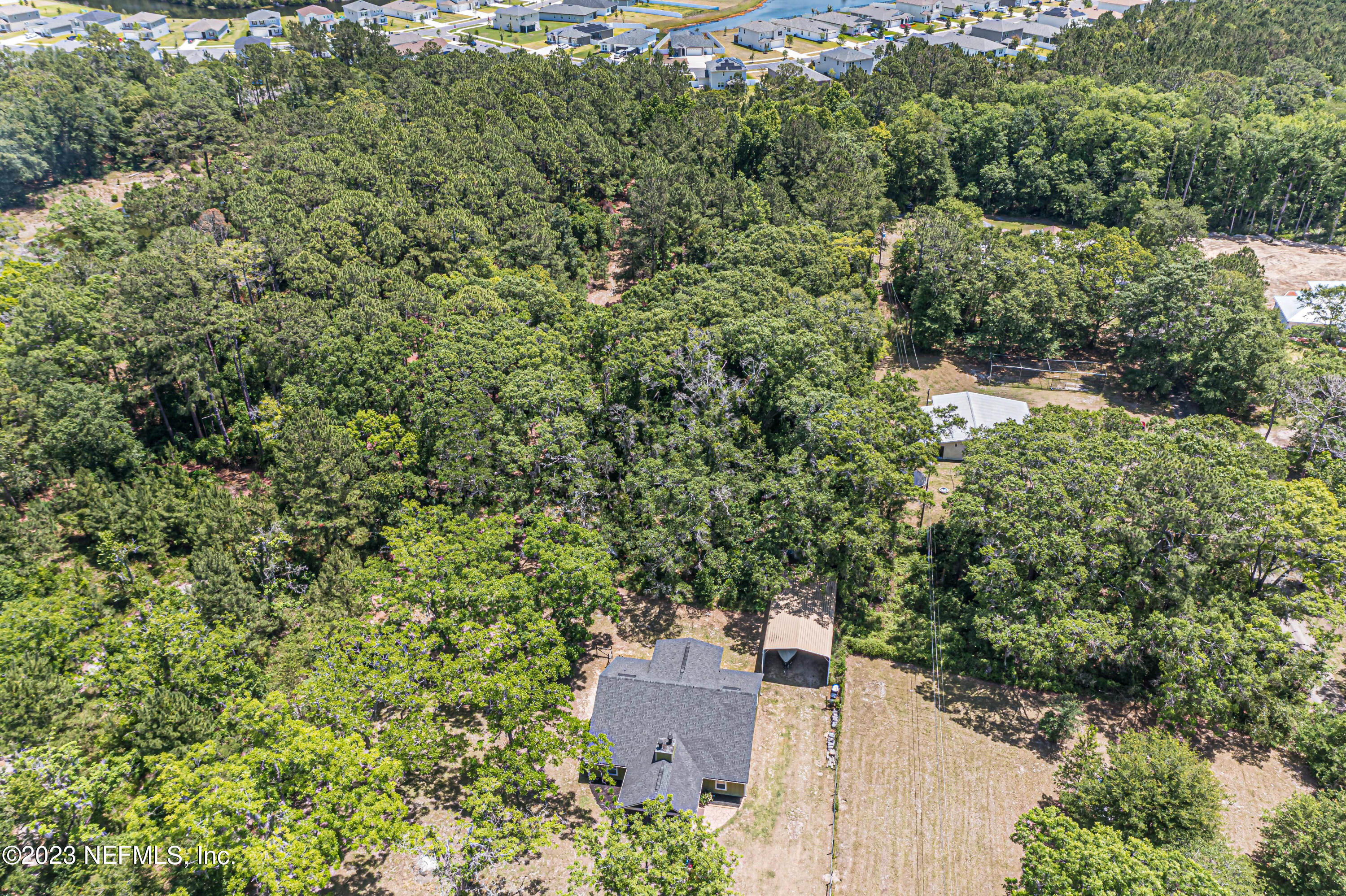 1199 Hatcher Road Middleburg, FL 32068 - Photo 55 of 55 an aerial view of a house with a yard